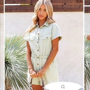 Pocketed, snap button, cotton romper. Light sage green color.